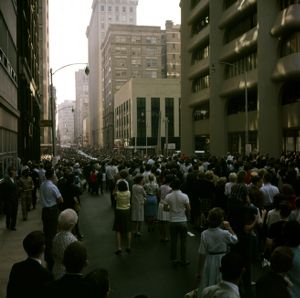 Crowds swarm to see President Lyndon B. Johnson parade through downtown Atlanta, 1964
