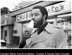 Basketball player Walt Frazier takes a nostalgic tour of the Sweet Auburn district and the surrounding neighborhoods where he grew up, 1983