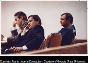 Defense attorney Jimmy Berry listens intently during a pretrial hearing for his client James Caldwell, 1991