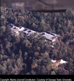 Aerial of the Simmons Company headquarters located on a wooded lot, 1975