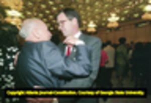 Atlanta Organizing Committee Member Billy Payne celebrating in Tokyo after winning the Olympic bid, 1990