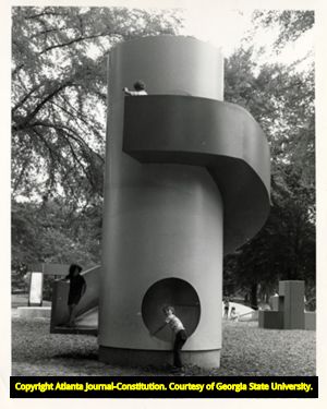 Children sliding down Isamu Noguchi's Playscapes playground in Piedmont Park, 1981