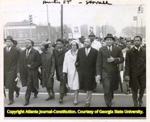 Martin Luther King Jr. with Coretta Scott King, John Lewis, James Forman, Ralph David Abernathy and others lead a demonstration to the capitol in response to the treatment of Representative Julian Bond, 1966