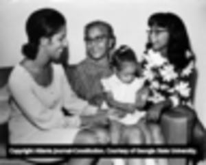 Mayor Maynard Jackson's wife Bunnie Jackson with mother and children, 1970s