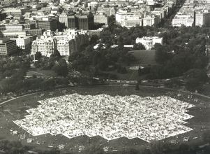 Names Project quilt laid out in the Ellipse, just south of the White House, at this point composed of nearly 8,300 panels, each made by hand, honoring the memory of an AIDS victim, Washington, D.C., October 8, 1988.