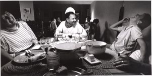Tom Fox with his friends, Linda Hiligross and Bonny Baratta, eating dinner at a condominium owned by Bonny's parents, Newport, Oregon, July 1, 1989.