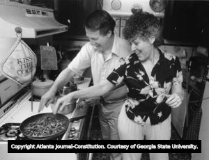 Playwright Cary Bynum and actor Brenda Bynum prepare dinner at home, Atlanta, Georgia, June 1985.