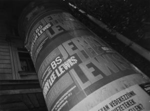 Posters adorn a pillar advertising Jerry Lee Lewis in concert, Budapest, Hungary, December 12, 1989.