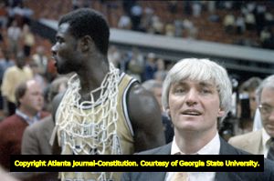 Yvon Joseph and coach Bobby Cremins following Georgia Tech's victory at the 1985 ACC champsionship against the North Carolina Tar Heels, the Omni Coliseum, Atlanta, Georgia, March 10, 1985.