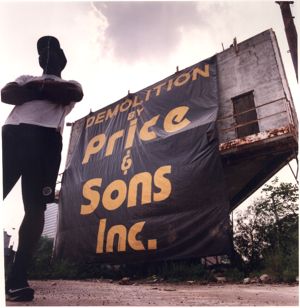 Regular dweller at the MARTA bus repair facility on Piedmont and Pine, since demolished, stands near a vacant space soon to ocupied by one of Atlanta's homeless, Atlanta, Gerogia, August 23, 1992.