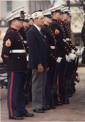 Gene Yearwood, Pearl Harbor veteran, with Marines at Pearl Harbor commemoration ceremonies, Naval Air Station, Atlanta, Georgia, December 7, 1988.
