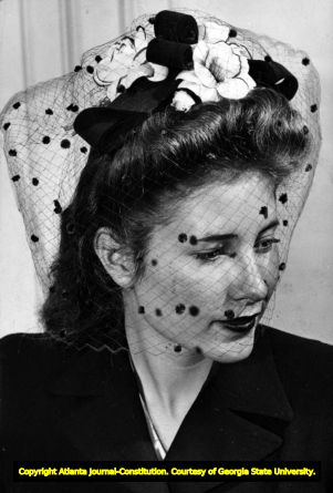 Jean Fraser wearing a flowered hat, with net, Atlanta, Georgia, 1942.