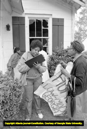 Members of Georgia Action / ACORN during a protest of absentee landlords and poorly maintained vacant housing, Atlanta, Georgia, April 17, 1982.