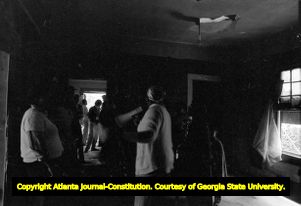 Members of Georgia Action / ACORN during a protest of absentee landlords and poorly maintained vacant housing, Atlanta, Georgia, April 17, 1982.