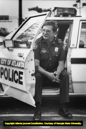 Atlanta police Officer T.C. Cook, suspended for two days for accompanying the body of slain police Officer Layne B. Cook across the Georgia state line to Jasper, Alabama, for burial, Atlanta, Georgia, May 19, 1989.