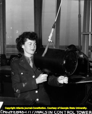 WAC Corporal Eleanor Cunningham in Control Tower, Eglin Air Force Base, Florida, February 2, 1945.