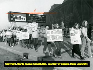 Georgia demonstrators outside a meeting of the "moral majority," Omni Coliseum, Atlanta, Georgia, October 11, 1980. Among issues being supported by demonstrators are Gay Rights and Women's Right to Choose.