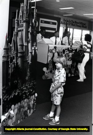 Disney World advertisement cutout.