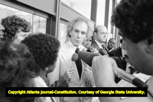 Millard Farmer addressing the media outside the U.S. Court of Appeals, Fifth circuit, following a hearing for convicted murderer, Jack Potts, Atlanta, Georgia, June 10, 1980.