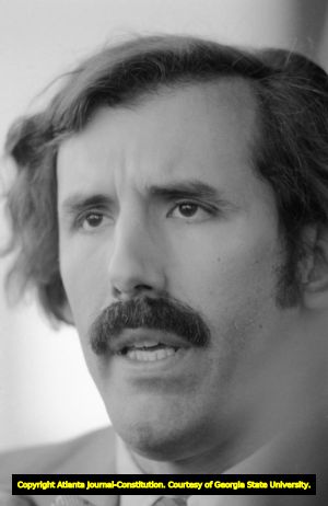 Unidentified man speaking outside of the courthouse following a hearing for convicted murderer, Jack Potts, Atlanta, Georgia, June 10, 1980.