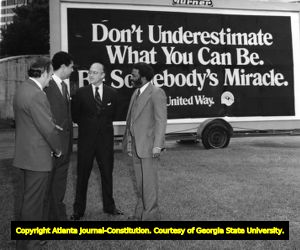 John Henderson, Atlanta Mayor Maynard Jackson, Ivan Allen III, and William "Sonny" Walker, supporting the United Way, Atlanta, Georgia, 1970s?