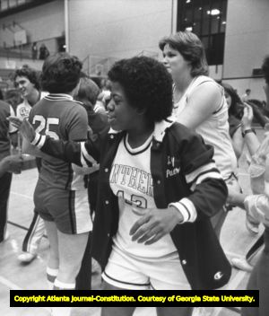 Georgia State University women's basketball players celebrating after defeating the University of Georgia, Atlanta, Georgia, January 6, 1982.