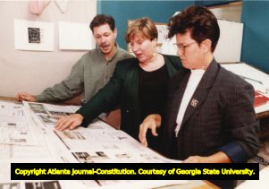 Leigh VanderEls (center), general manager of Atlanta gay weekly Southern Voice, with Editor Chris Cash (right) and Tim Boyd of advertising sales, Atlanta, Georgia, September 15, 1992.