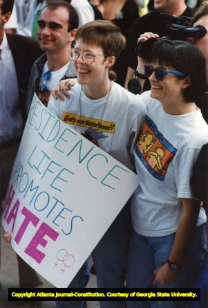 Emory graduate students Carrie Jane Singleton, left, and Janet Jakobsen attend a gay and lesbian student protest against the university's handling of complaints of harassment of two gay men in a freshman dorm, Atlanta, Georgia, March 2, 1992.