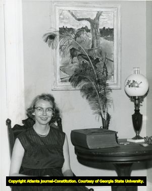 Flannery O'Connor, seated, in her home, Milledgeville, Georgia, 1962.