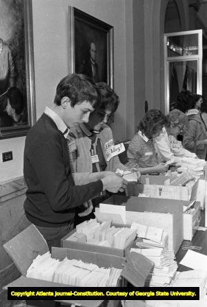 Opponents of the Equal Rights Amendment, distributing anti-feminist literature during the Georgia State House of Representatives' vote on ratification for the ERA, Atlanta, Georgia, January 20, 1982.