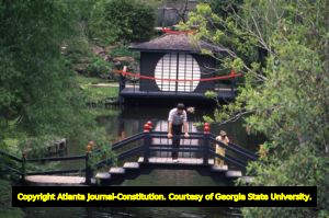 Father and daughter on bridge in Japanese Garden at Bellingrath Gardens and Home, in Theodore, near Mobile, Alabama, April 22, 1988.