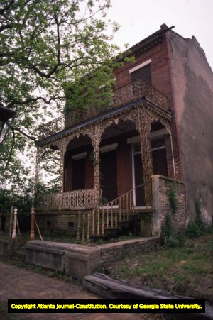 Historic house with ornamental iron porch, Mobile, Alabama, April 22, 1988.