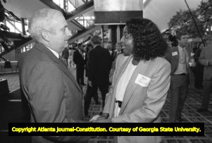 Dan Sweat with Rhonda Brown (Brown Office Supply), at Atlanta Chamber of Commerce event honoring Dan Sweat, Atlanta, Georgia, July 13, 1988.