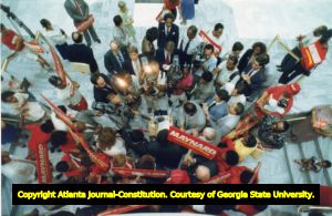 Maynard Jackson addresses the press and supporters after qualifying for the Mayor's race, City Hall, Atlanta, Georgia, August 14, 1989.