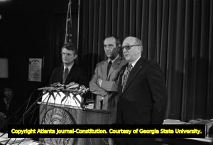 Speaker of the House Thomas B. Murphy (right) and Zell Miller (left), with Governor George Busbee, during the Georgia State House of Representatives' debate on ratification of the Equal Rights Amendment, Atlanta, Georgia, January 20, 1982.