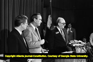 Speaker of the House Thomas B. Murphy (right) and Zell Miller (left), with Governor George Busbee, during the Georgia State House of Representatives' debate on ratification of the Equal Rights Amendment, Atlanta, Georgia, January 20, 1982.