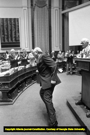 Representative Tom Murphy dancing in front of the Georgia State House of Representatives during debate on ratification of the Equal Rights Amendment, Atlanta, Georgia, January 20, 1982.
