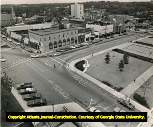 Decatur, Georgia: Lettering on downtown streets indicating the path of the MARTA extension, Decatur, Georgia, December 1972.