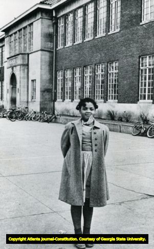 Linda Brown, daughter of Oliver Brown who was one of 13 plaintiffs in landmark civil rights Supreme Court case, Brown v. Board of Education. This photo is from an unknown source, Topeka, Kansas, 1960s (?).