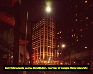 Nighttime photograph, looking south at 270 Peachtree Street (Georgia Power Company building), just after the intersection of Baker Street, Atlanta, Georgia, October 1964.