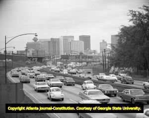 Traffic congestion on the Downtown Connector, looking southeast towards the Equitable Building, Atlanta, Georgia, May 1969.