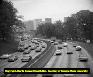 Traffic congestion on the Downtown Connector, looking southeast towards the Equitable Building, Atlanta, Georgia, May 1969.
