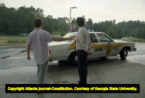 Gay man being arresting by undercover Gwinnett County Police during a raid in Gold Branch Park, Gwinnett County, Georgia, June 6, 1989.