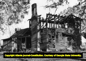 Tom Jackson house, with upper floor burned out, DeKalb County, Georgia, November 1953.