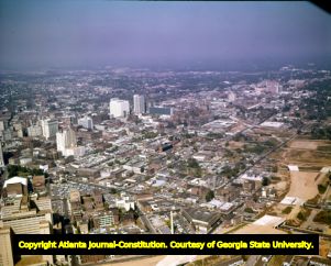 Aerial view of downtown, looking northwest, over the construction of the Downtown Connector, Atlanta, Georgia, October 1, 1961.