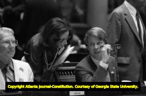 Georgia Senator Culver Kidd, Representitive Cathey Steinberg, and Senator Pierre Howard during Senate debate on ratification of the Equal Rights Amendment, Atlanta, Georgia, January 21, 1980.