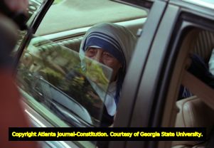 Mother Teresa visiting the Gift of Grace House, a home for women with AIDS her order opened in 1994, Atlanta, Georgia, June 13, 1995.