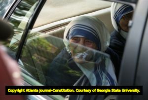 Mother Teresa visiting the Gift of Grace House, a home for women with AIDS her order opened in 1994, Atlanta, Georgia, June 13, 1995.