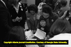 Opponents of the ERA writing messages to their congressmen during the Georgia Senate's vote on the ratification for the ERA, Atlanta, Georgia, January 21, 1980.