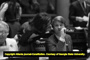 Georgia Senator Culver Kidd, Representitive Cathey Steinberg, and Senator Pierre Howard during Senate debate on ratification of the Equal Rights Amendment, Atlanta, Georgia, January 21, 1980.